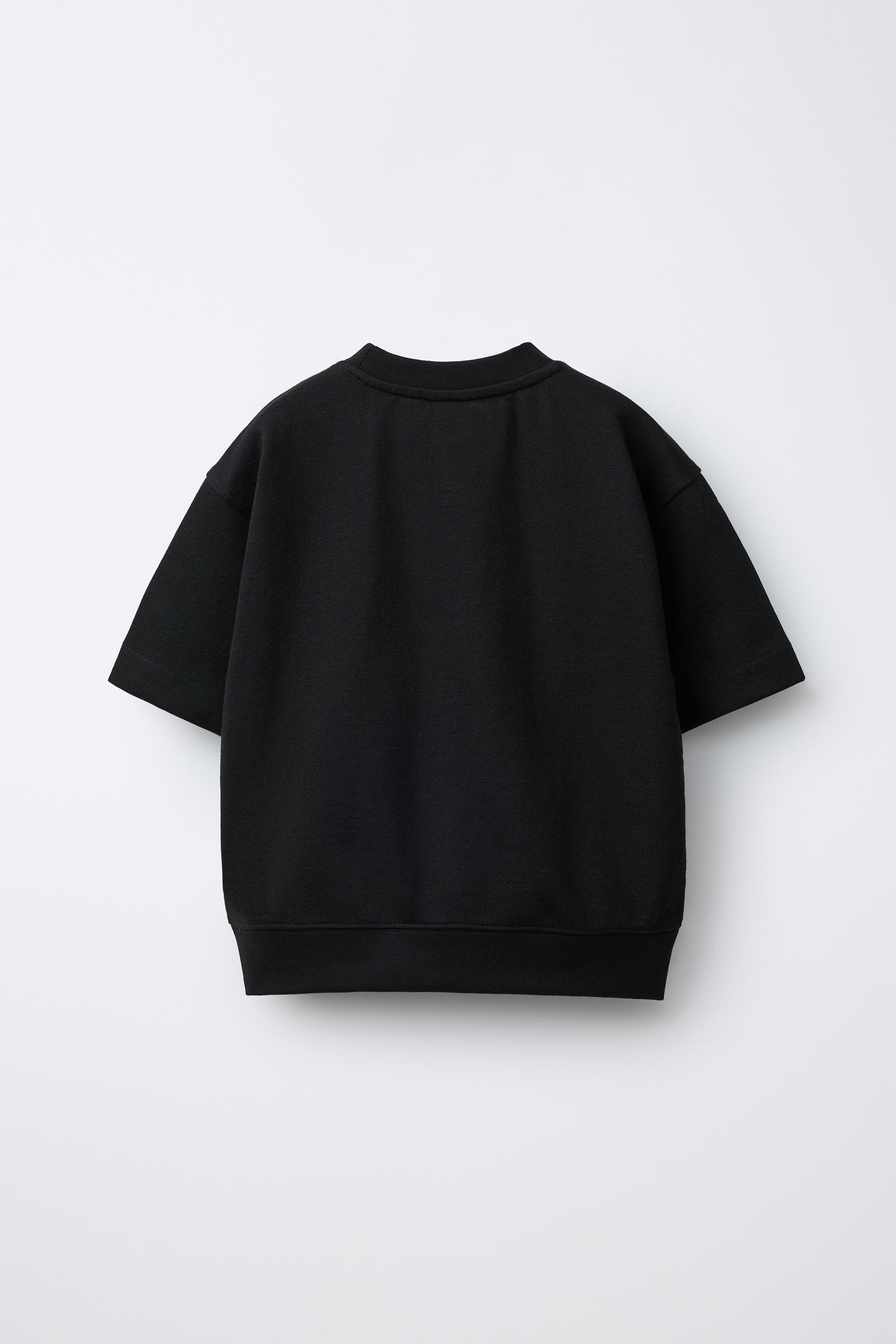 SHORT SLEEVE RAISED TEXT SWEATSHIRT